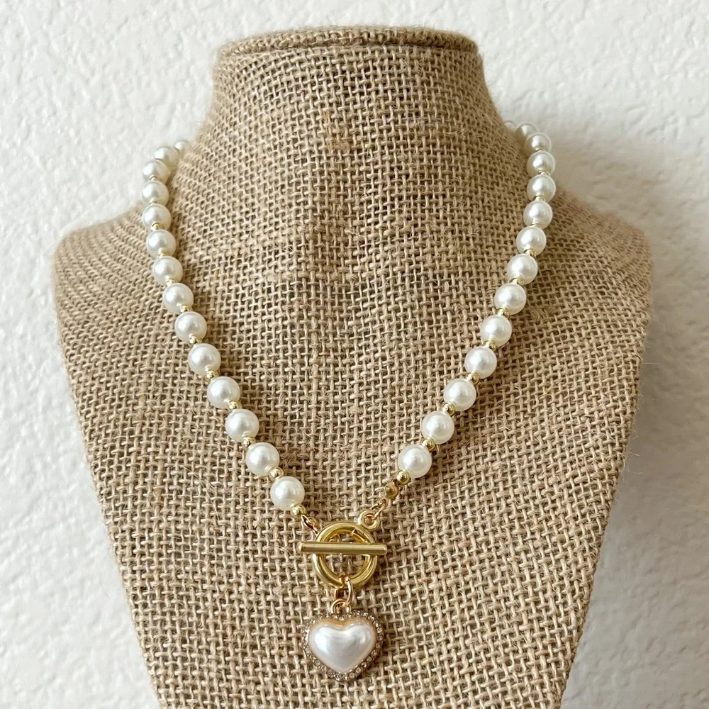 FINAL SALE | faux pearl necklace with a gold heart pendant - Picture 1 of 4